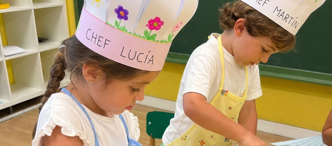Children cooking together at the summer camp